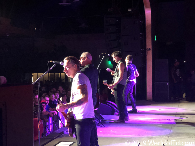 Bad Religion guitarists on stage.