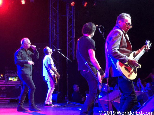 Bad Religion guitarists on stage.