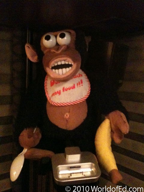 A stuffed monkey on the tour bus.