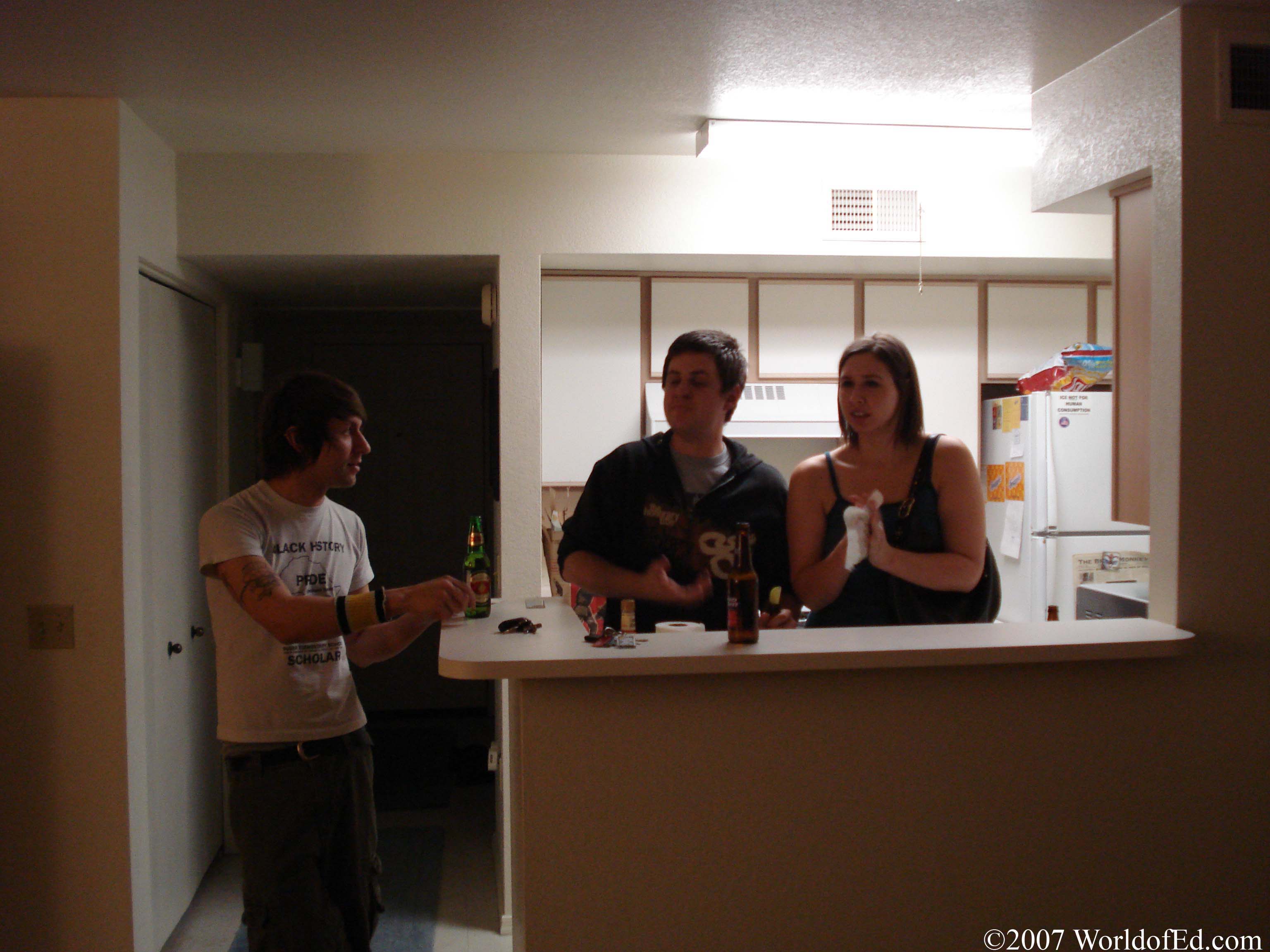 Mike Schey, Toco, and Lucy in Ed's kitchen.