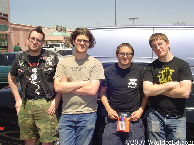 The Ergs! standing in front of their van.