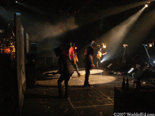 Cartel on stage performing.