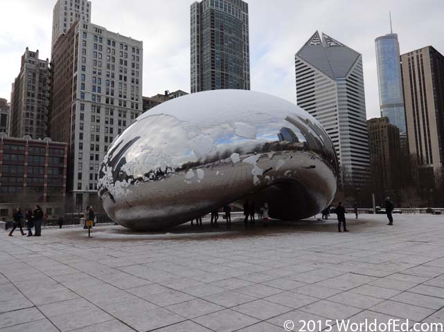 The Bean sculpture surrounded by skyscrapers.