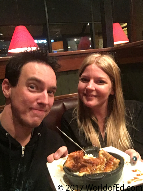 Special Ed and Cristy holding a plate of desert.