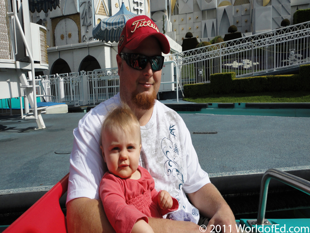 Kraig and Kailyn in a boat on a ride.