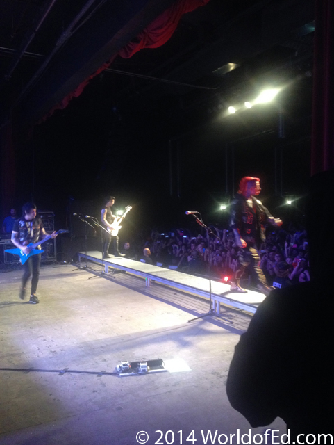 Falling In Reverse on stage performing.