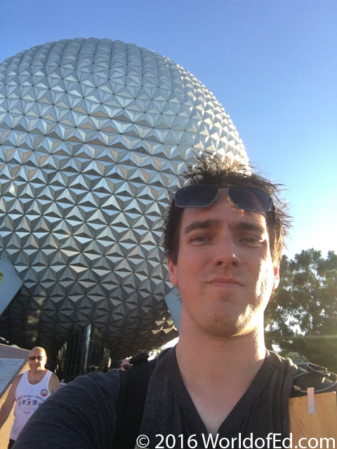 Special Ed standing in front of the Epcot ball.