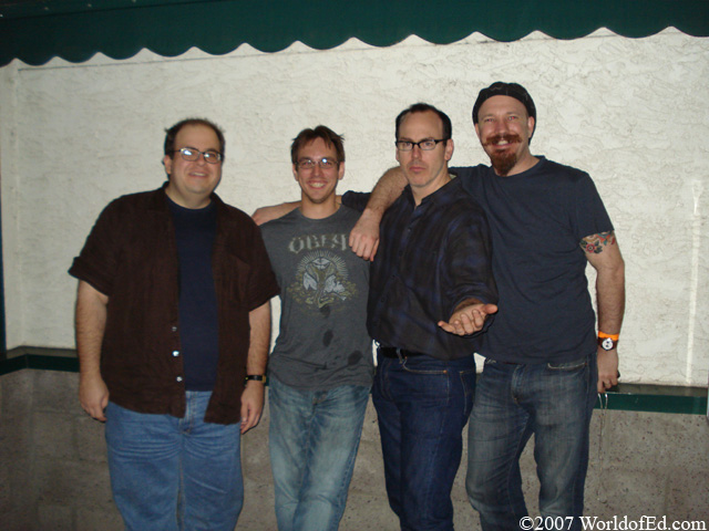 Special Ed, Greg Graffin, and his band standing.