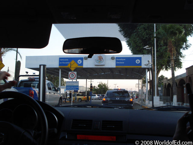 US-Mexico border crossing signs.