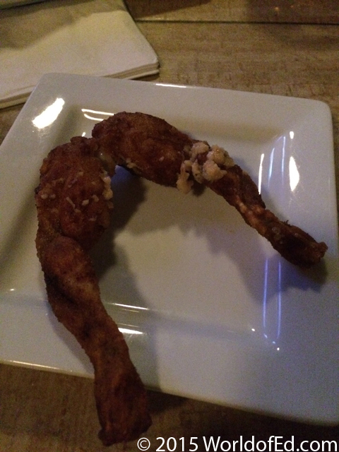 An order of frog's legs on a plate.