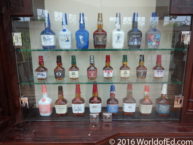 Limited edition bottles of Makers Mark in glass display cases.