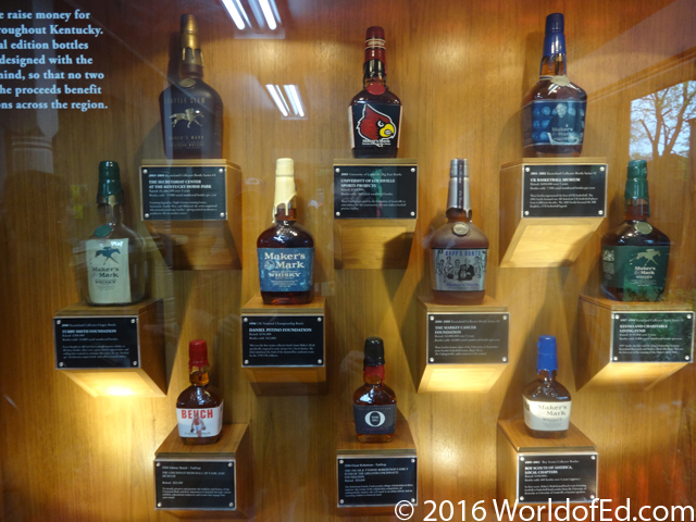 Benefit bottles of Makers Mark in glass display cases.