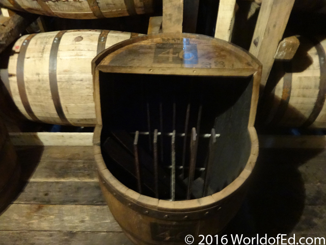 Oak staves in a barrel that are used for flavoring.