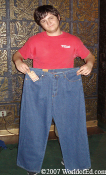 Toco holding jeans.