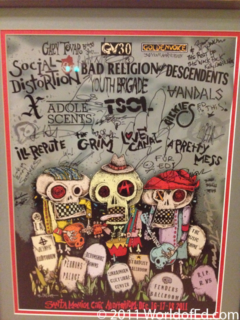A poster signed by various band members.