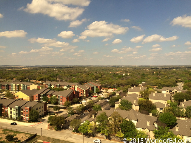 A view of the city from a high hotel window.