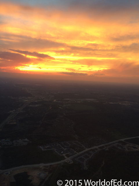 A sunset as seen from a plane interior.