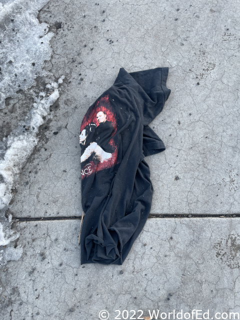A shirt laying on the ground.