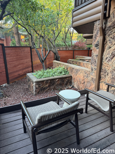 An outdoor patio with chairs.