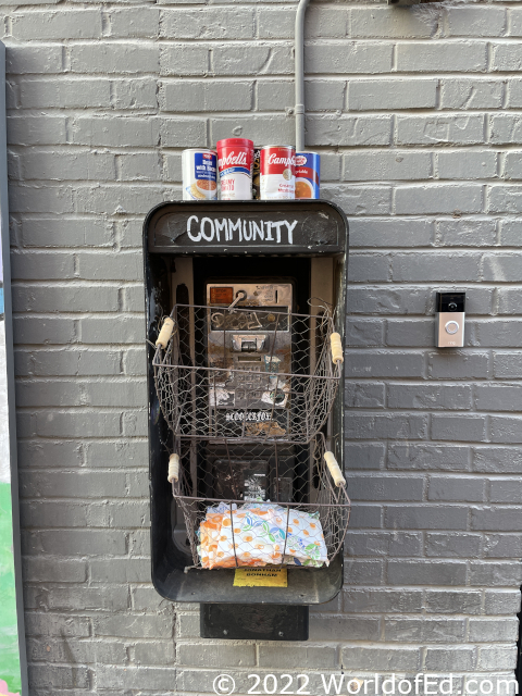 A telephone with canned goods.