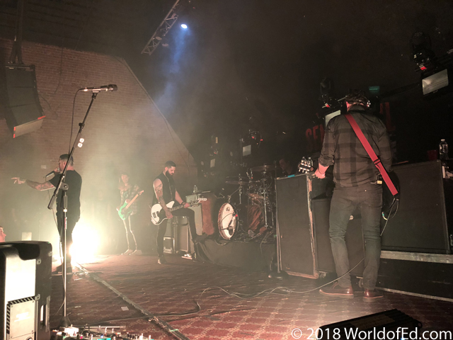 Senses Fail performing in white stage lights.