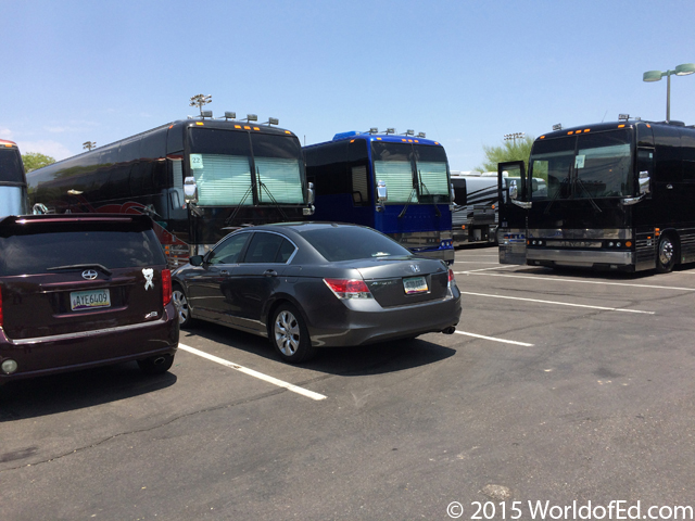 Special Ed's car parked with the tour buses.