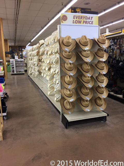 A stack of cowboy hats in a store.
