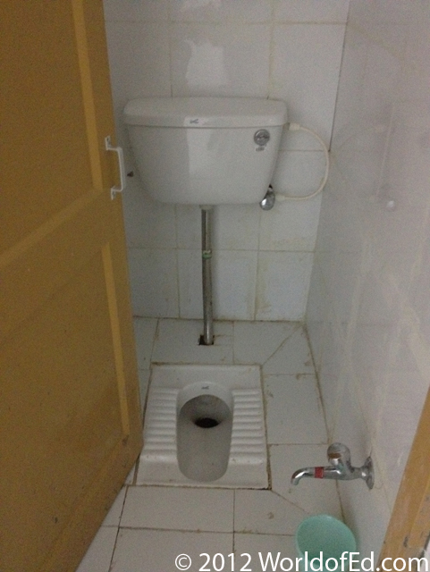 A floor toilet in the Mumbai airport.