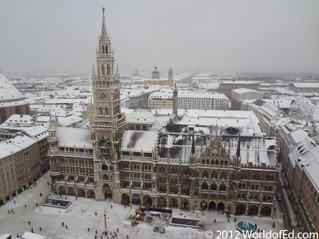 A picture of Munich covered in snow from a large tower.